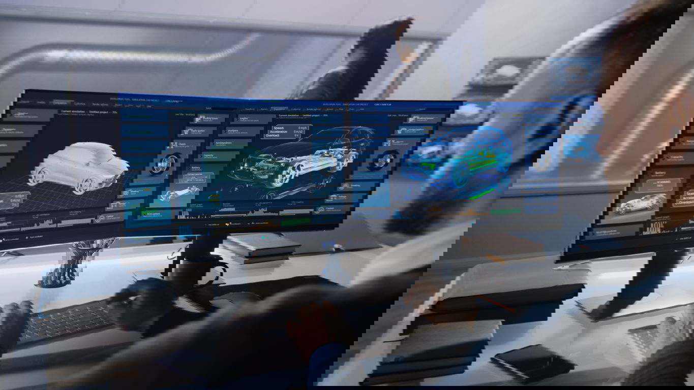 maschinenbauingenieur-berufsbild.jpg Ein Maschinenbauingenieur prüft am Computer die Aerodynamik eines E-Autos